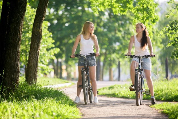 girls-riding-bike_1218-148